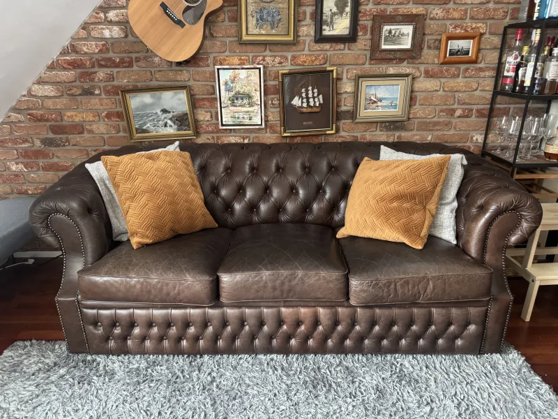 The leather Chesterfield sofa as you find it